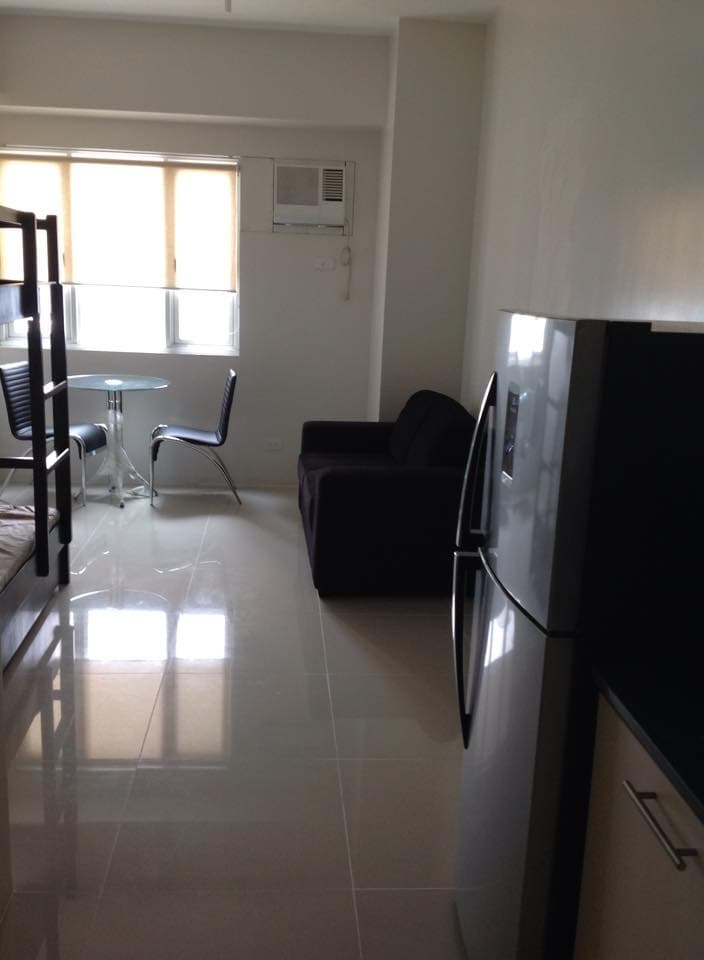 For lease - cozy studio unit, fully  furnished at SM Blue Residences beside Ateneo de Manila - Image 1 of 5